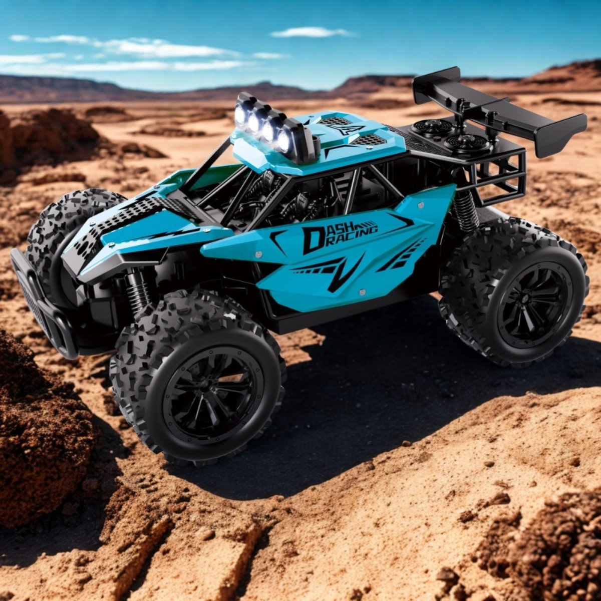 A cyan blue Dash Racing 1:16 scale high-speed remote control car parked on a sandy desert terrain under a clear blue sky.
