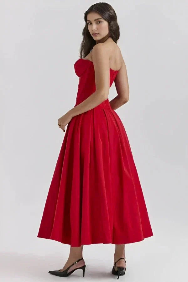 structured bodice, cinched waist, voluminous skirt, old Hollywood glamour and elegant evening attire