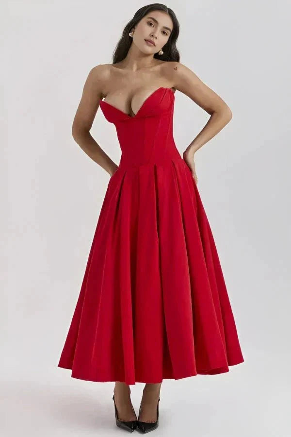 structured bodice, cinched waist, voluminous skirt, old Hollywood glamour and elegant evening attire