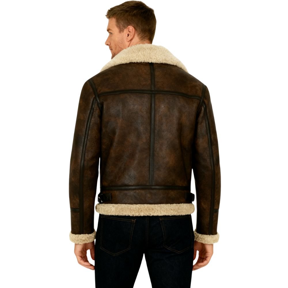 Man wearing a brown kouvr leather jacket with white fur lining on a white background