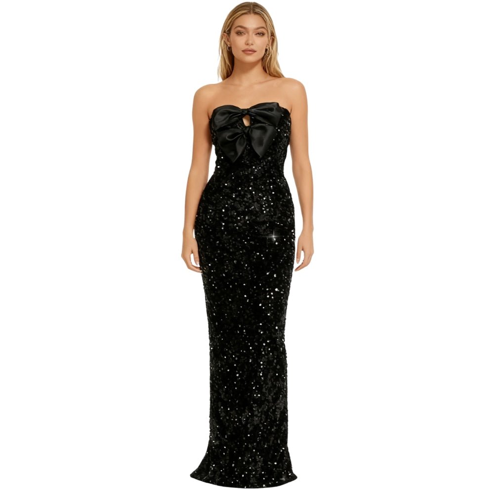 Black Kouvr strapless gown with a large bow detail on a white background