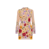 Model wearing Kouvr floral embroidered mini dress at a luxury event
