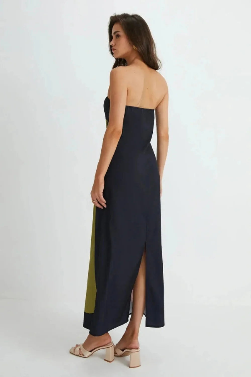 Model wearing the Kouvr Elizabeth abstract floral strapless evening dress