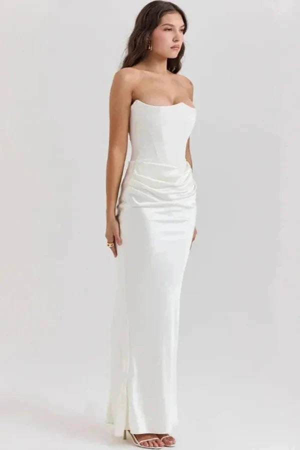 sculptural," "bodice," "silhouette," "boning," "crepe back satin," "floor-length," "architectural