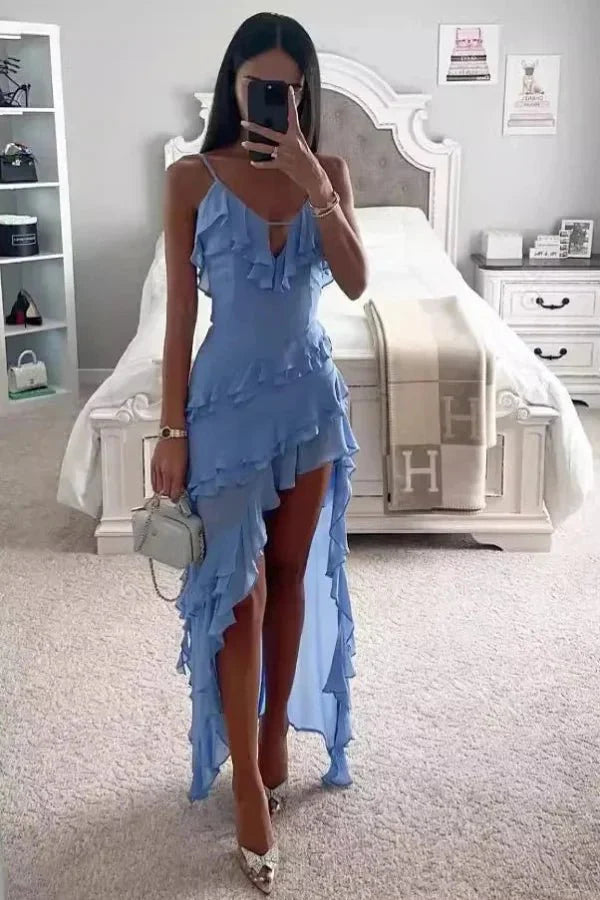 Model wearing Kouvr Aiah light blue asymmetric ruffle midi dress for a cocktail event