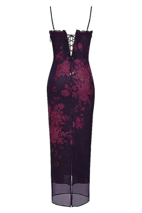 Model wearing Kouvr shaira purple floral corset maxi dress with lace trim for a formal event