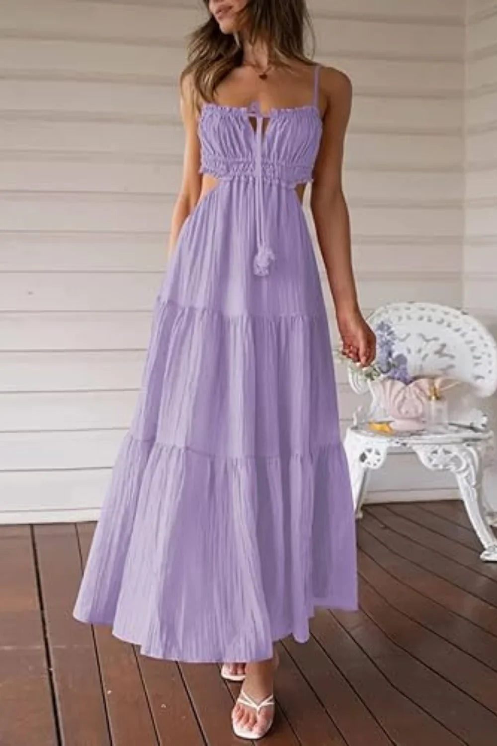 Model wearing the Amelia lavender tiered cutout maxi dress by Kouvr, front view.