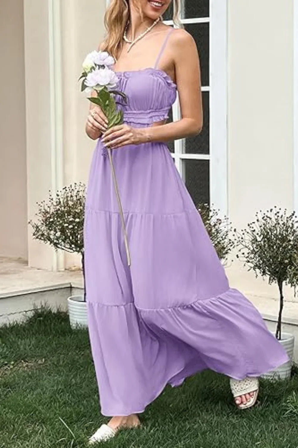 Model wearing the Amelia lavender tiered cutout maxi dress by Kouvr, front view.