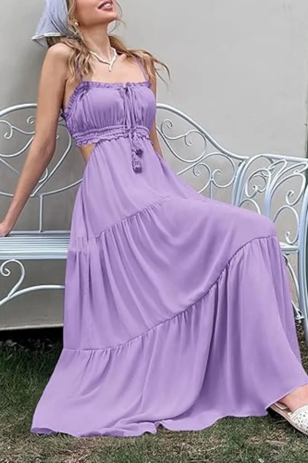 Model wearing the Amelia lavender tiered cutout maxi dress by Kouvr, front view.