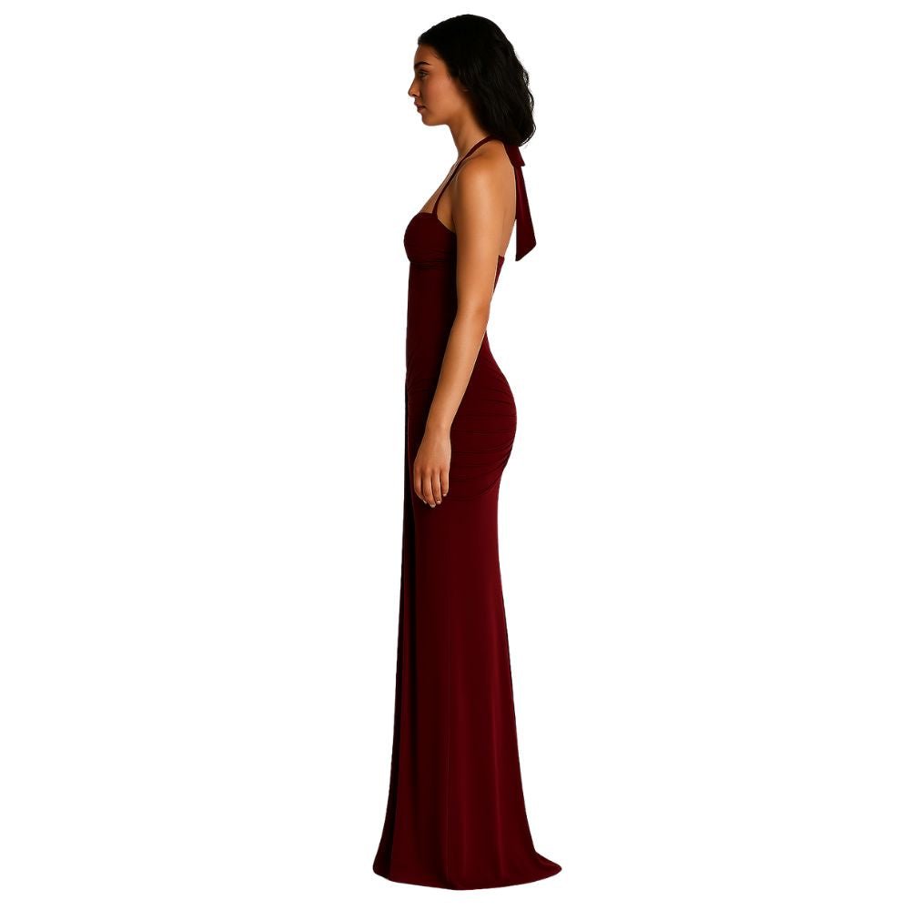 Model wearing Kouvr Fashion Amoura Gown in burgundy showing side mesh panel detail