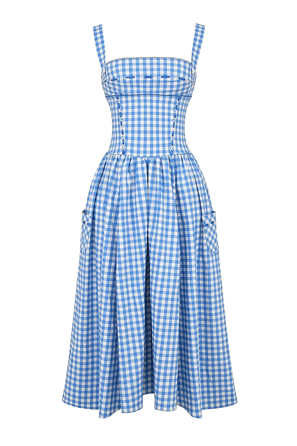 Model wearing the Kouvr Apolline blue gingham midi dress with a structured corset bodice and square neckline, standing in a garden