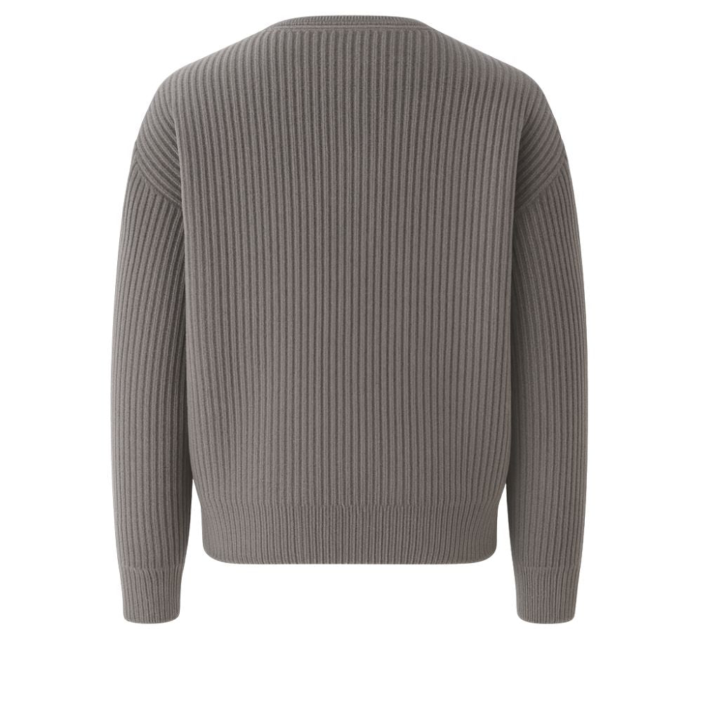 collarless bomber jacket," "minimalist sweater jacket," "quiet luxury knitwear," "structured knit," "transitional outerwear