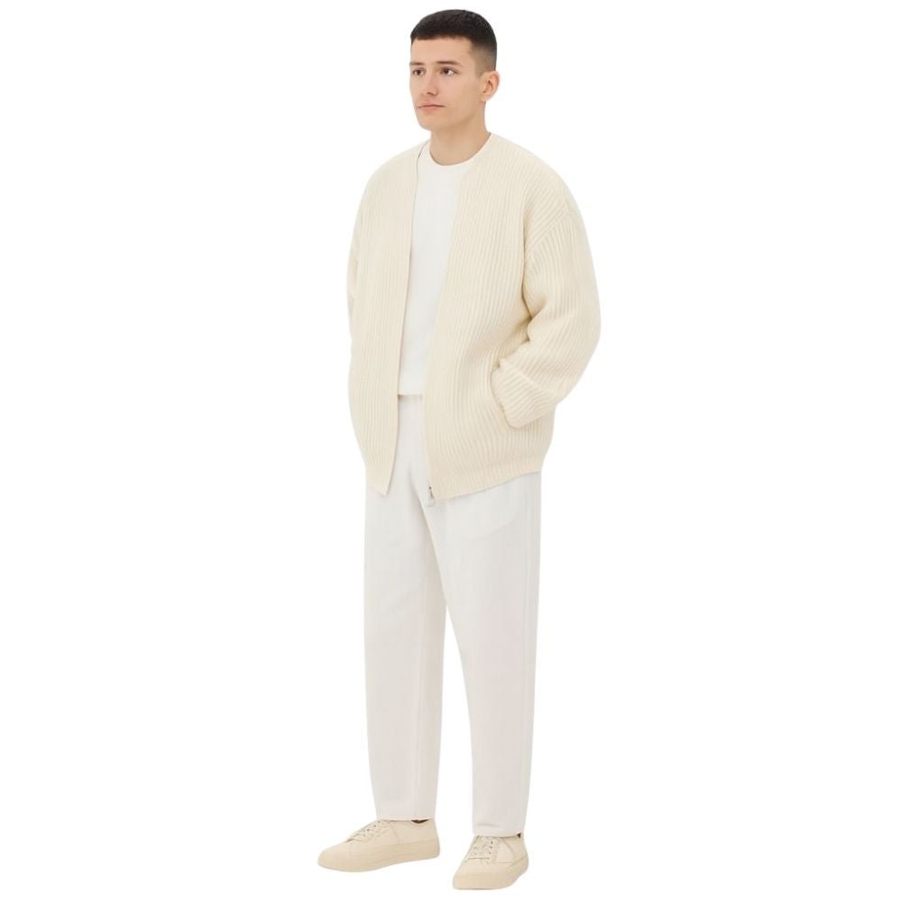 Minimalist zip up sweater, collarless knit outerwear, luxury oversized cardigan, quiet luxury jacket, off-white structured knit, contemporary men's knitwear