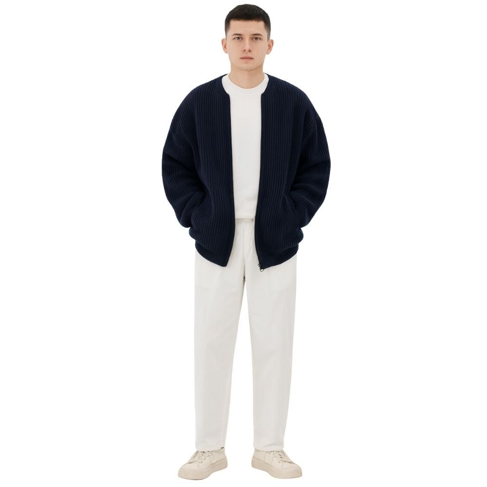 quiet luxury menswear," "minimalist layering piece," "structured knitwear," "transitional outerwear," "designer cardigan