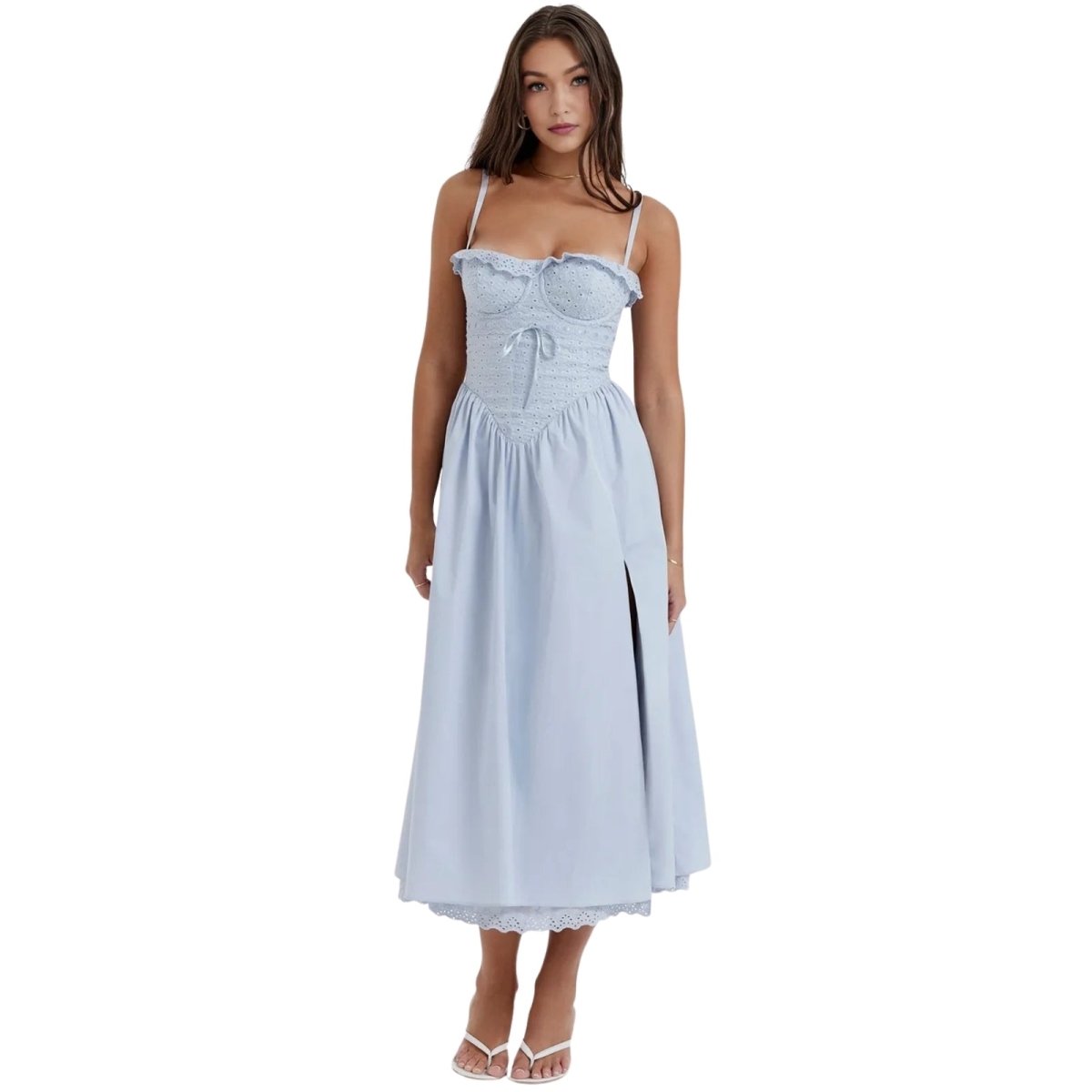 Woman wearing a light blue Kouvr striped dress on a white background