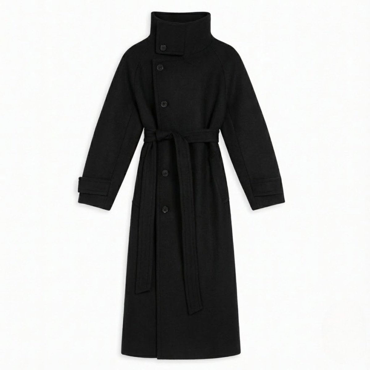 Flat lay of the Kouvr Ashley long black wool coat showing the asymmetrical button closure at the funnel neck and the self-tie belt.