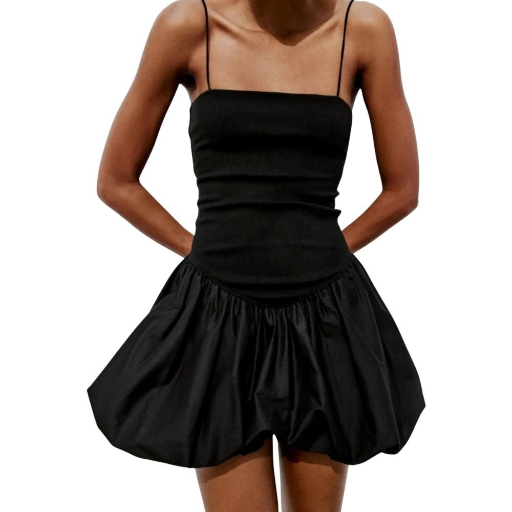 Model wearing the Kouvr Aubrey black mini dress with a voluminous bubble skirt and square neckline