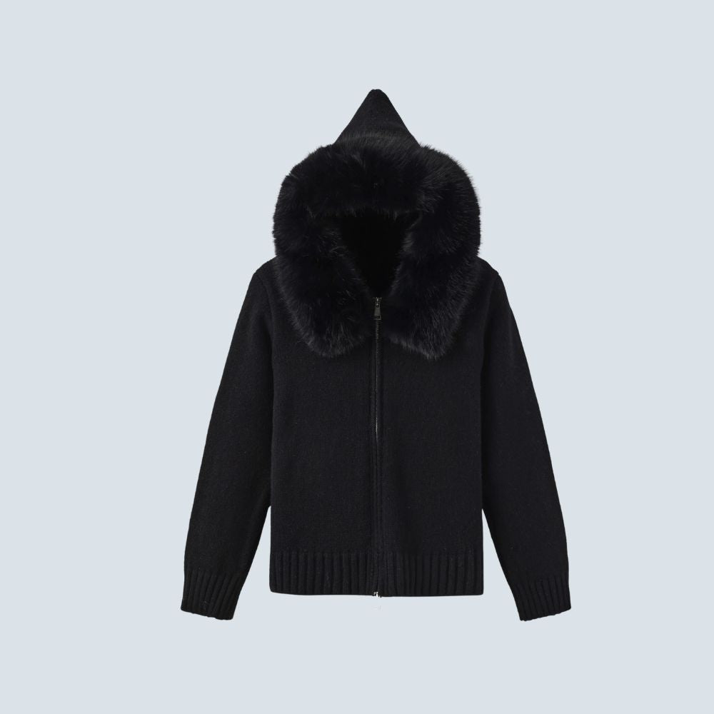 Woman wearing Kouvr black wool and cashmere blend hoodie with large fox fur trim hood