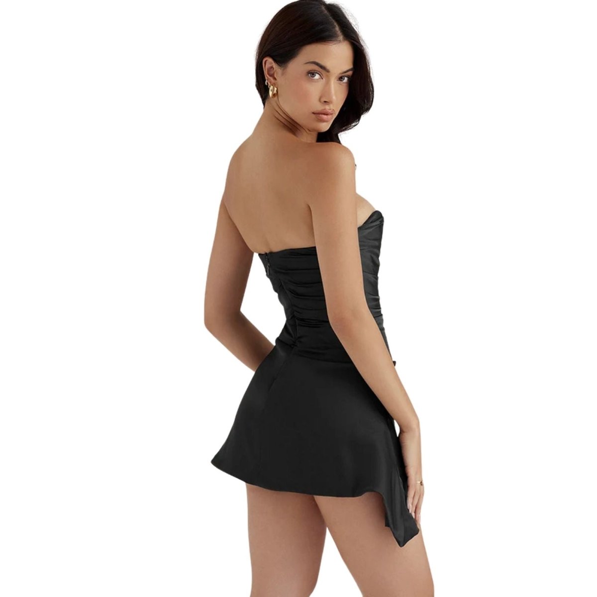 Side view of the Kouvr black strapless mini dress showing the asymmetrical skirt detail.