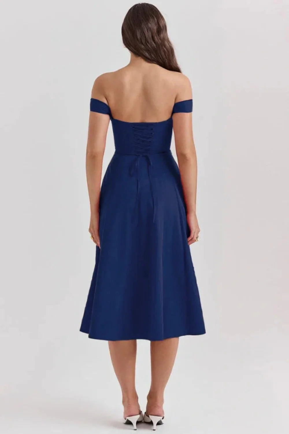 sculpted silhouette,' 'structured bodice,' 'cinched waist,' 'sweetheart neckline,' 'lace-up back,' and 'timeless elegance