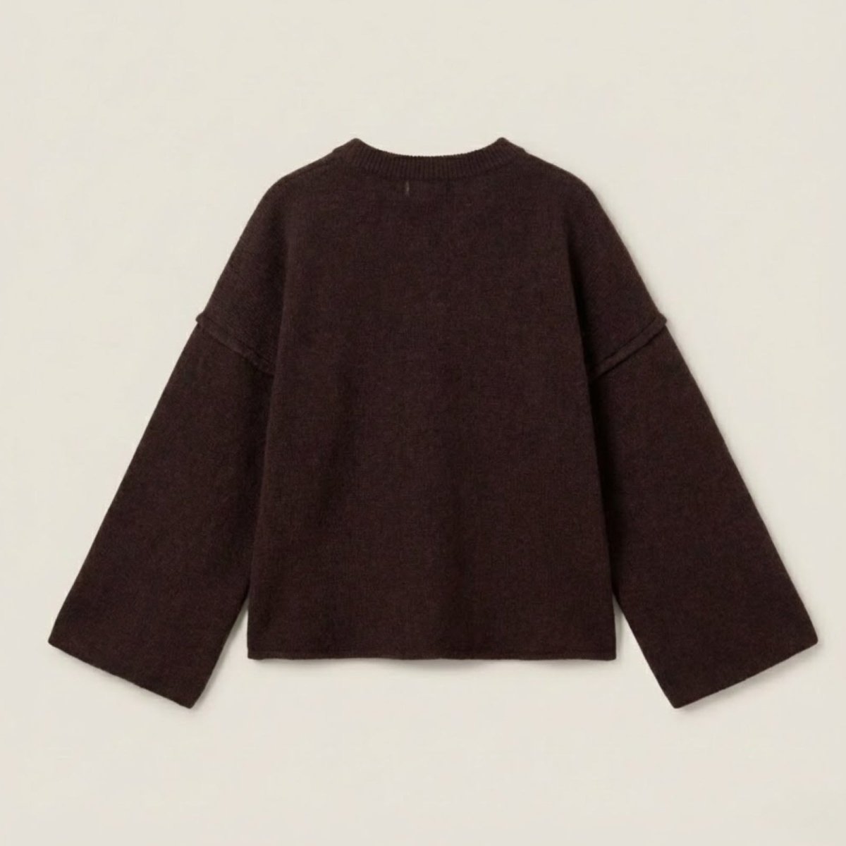Back flat lay of the Kouvr dark brown wool sweater with drop shoulder detail.