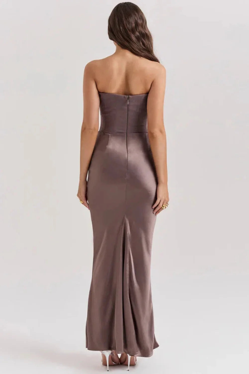 sculptural," "figure-flattering," "boned bodice," "ruched hip detail," and "black-tie attire