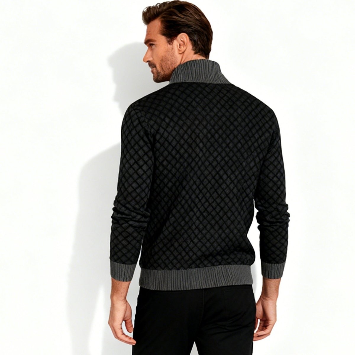 Back view of the Kouvr Argento diamond-knit sweater highlighting the full pattern and ribbed hem.
