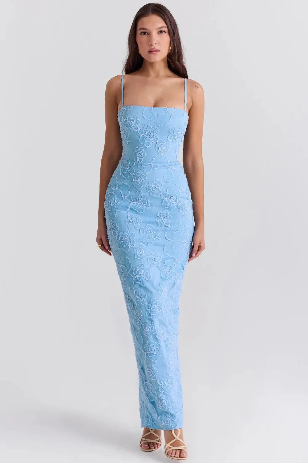 Model wearing Kouvr light blue floor-length gown with 3D floral embroidery