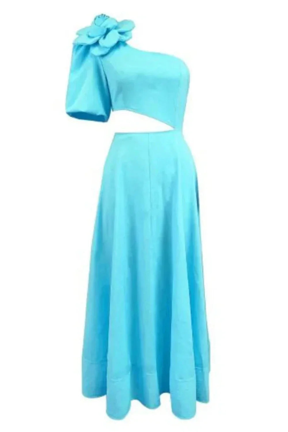 Model standing on a staircase wearing the Kouvr light blue one-shoulder dress with a large flower detail and side cutout