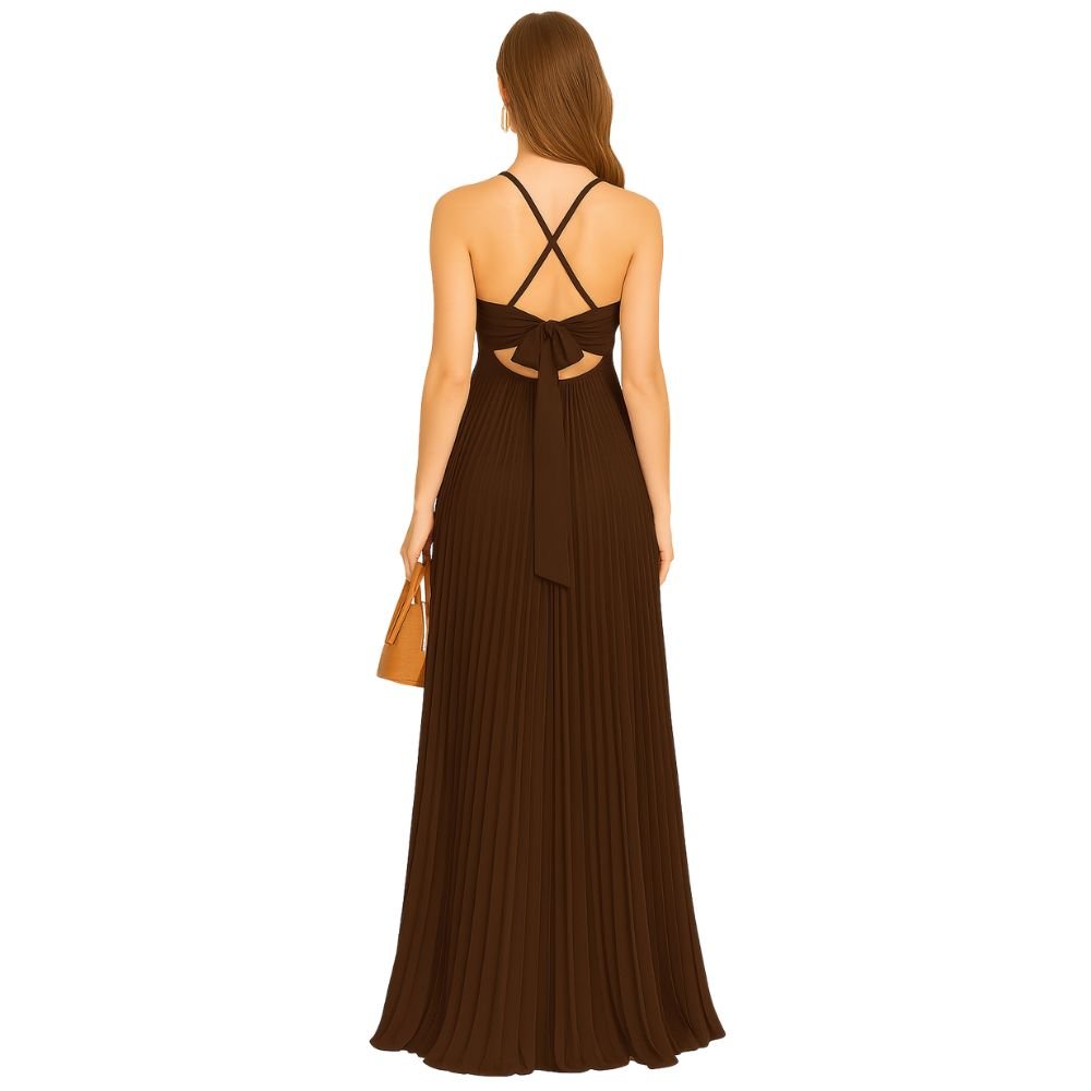 Model wearing Kouvr brown pleated floor-length halter gown with side cutouts and an open back