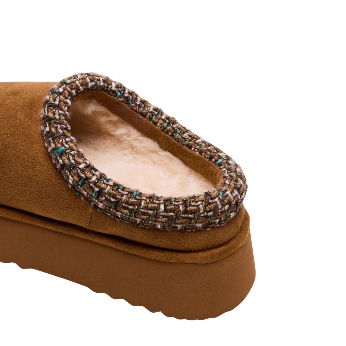 Brown kouvr slipper with woven trim on a white background