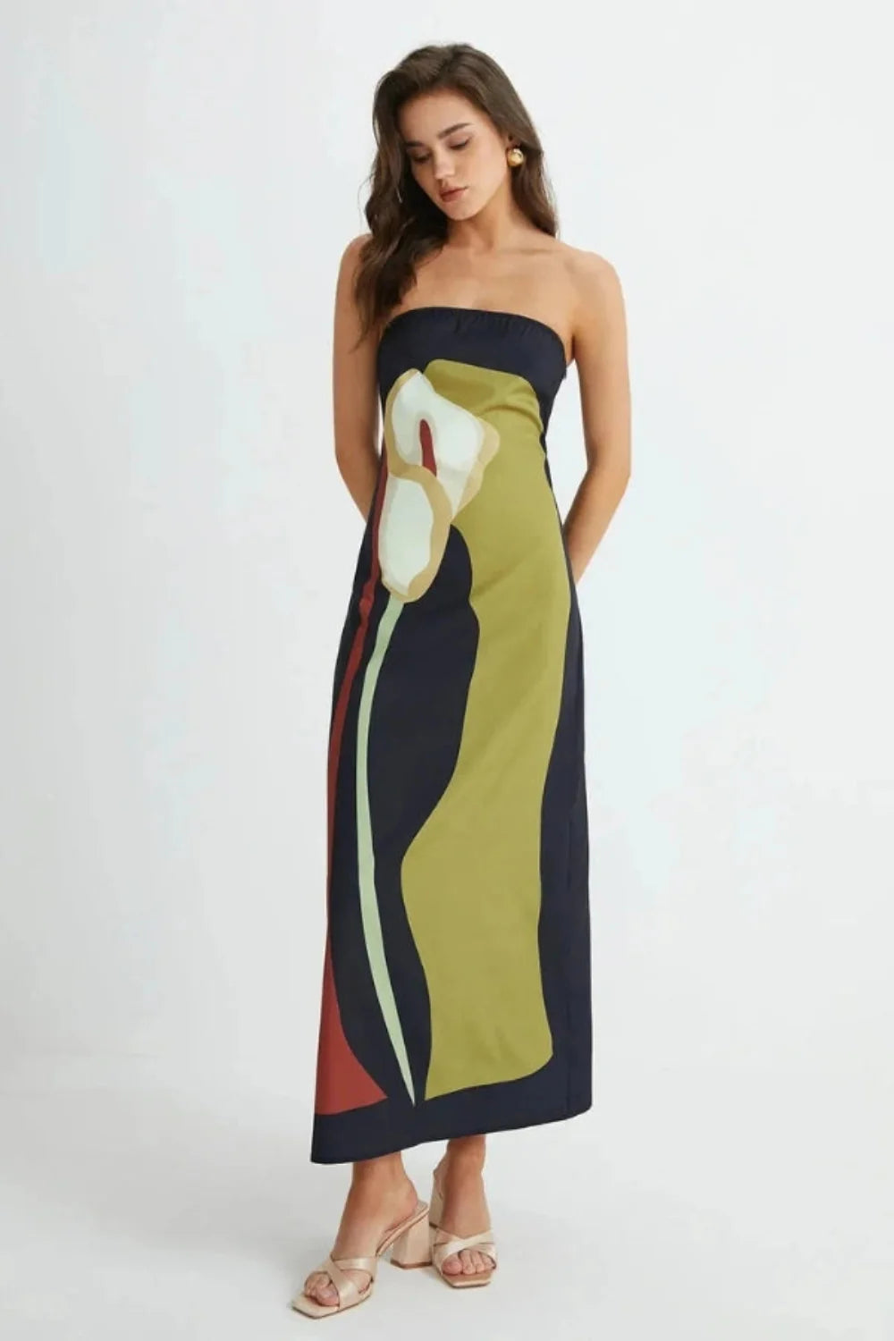 Model wearing the Kouvr Elizabeth abstract floral strapless evening dress