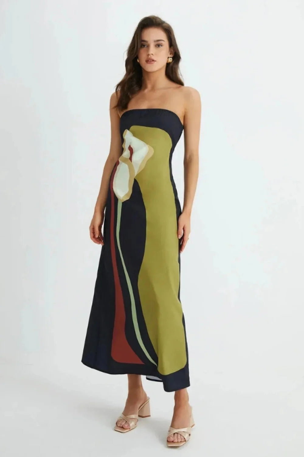 Model wearing the Kouvr Elizabeth abstract floral strapless evening dress