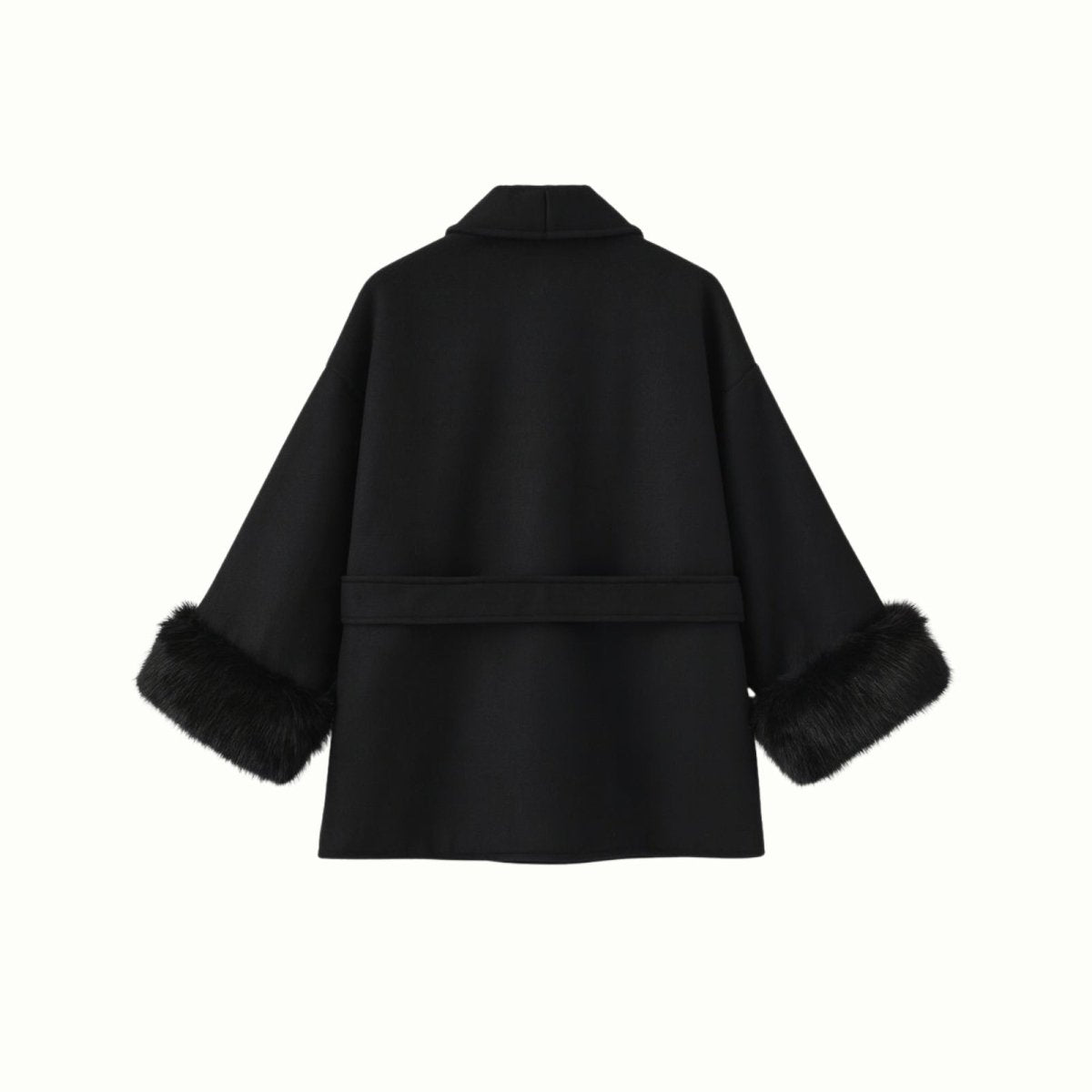 Black Kouvr coat with fur cuffs on a white background