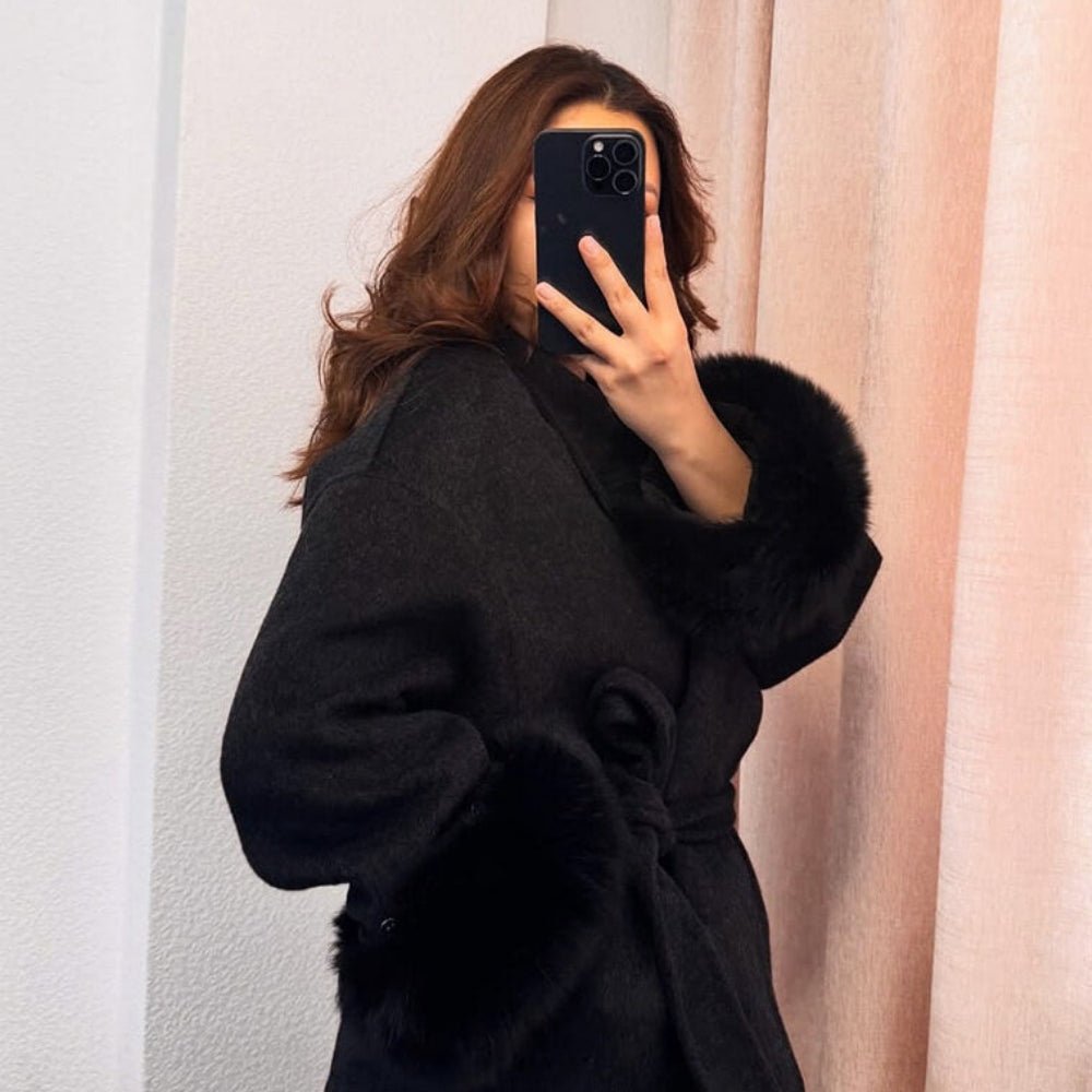 luxury winter outerwear", "designer belted coat", "women's evening coat", "statement sleeve coat", "cashmere blend jacket