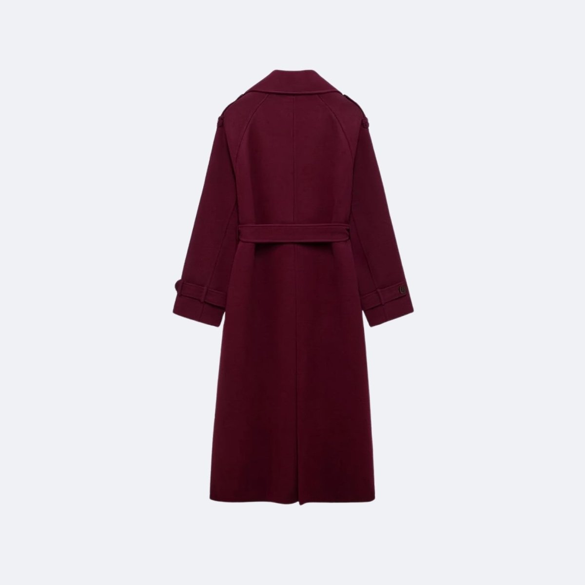 Flat lay of the back of the Kouvr Fashion Esther burgundy trench coat, detailing the back vent, belt loop, and shoulder construction.