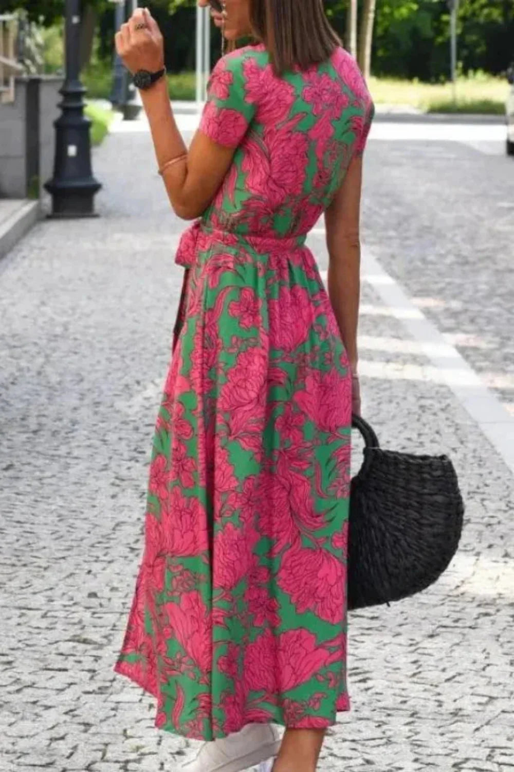 Back view of the Aleia pink and green floral A-line wrap dress.