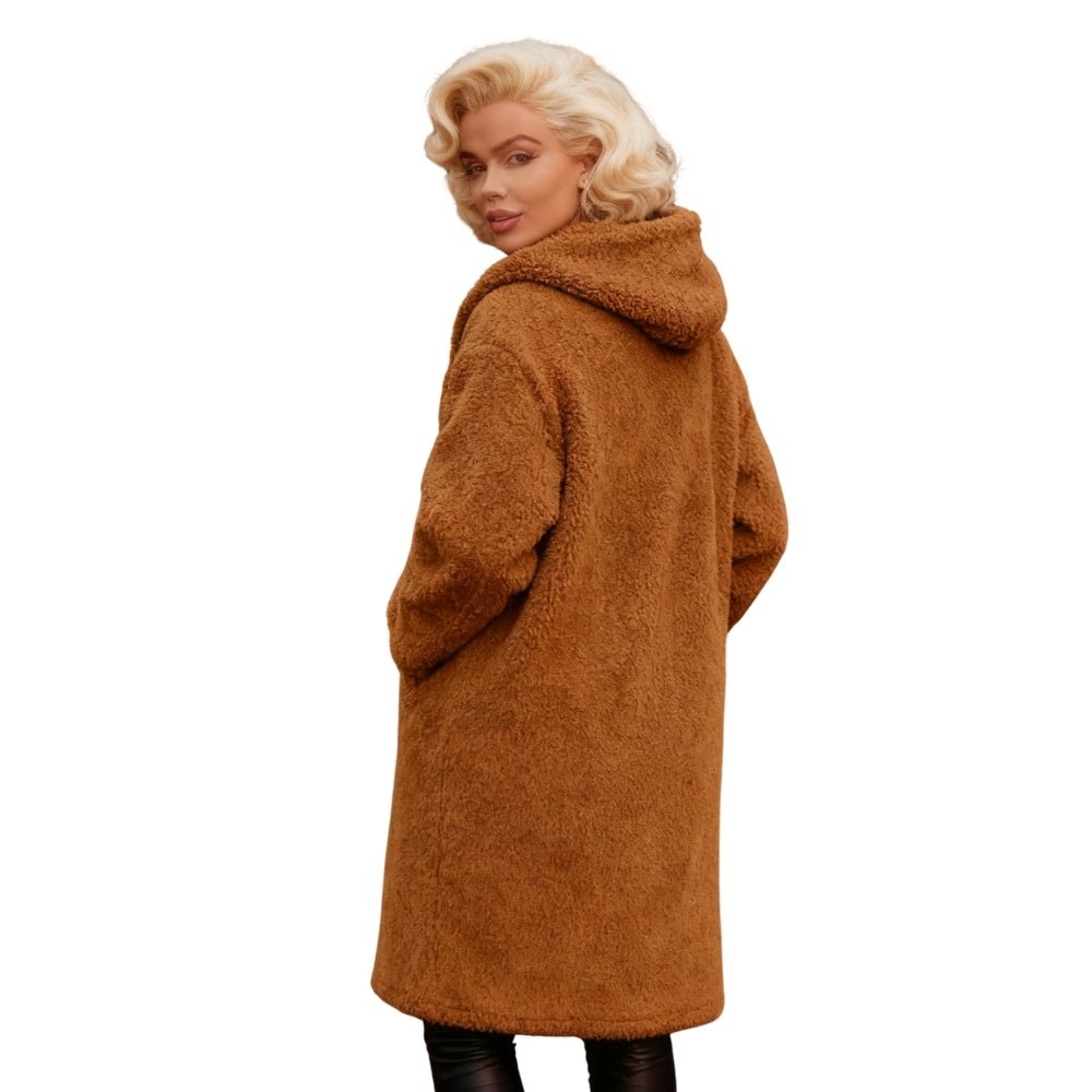 plush silhouette," "statement outerwear," "winter wardrobe essential," and "cocoon coat