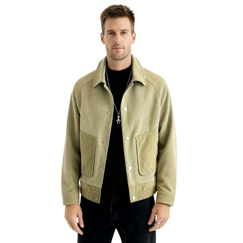 Man wearing a khaki kouvr jacket on a white background