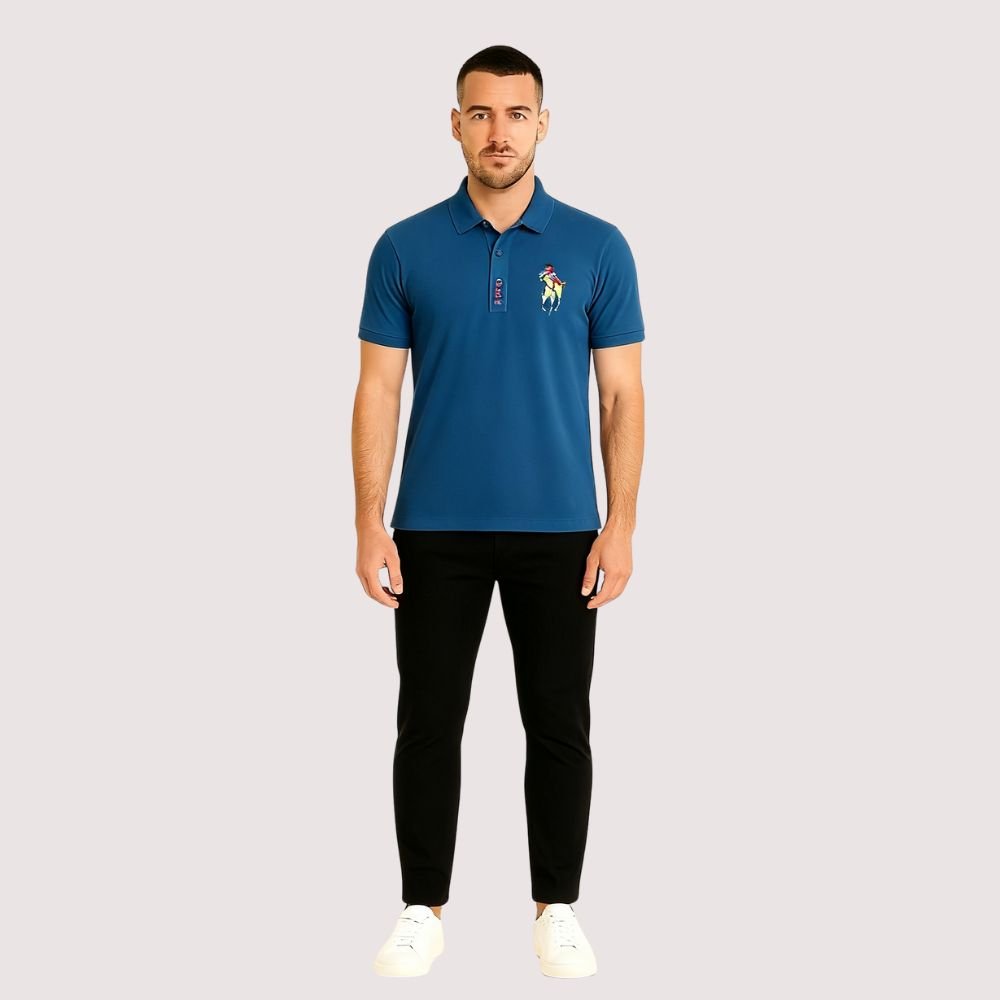 Model wearing the Kouvr Fashion Men's Slim Fit Piqué Polo in Azure Blue with black pants.