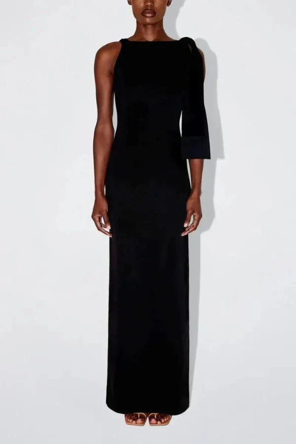 column silhouette," "draped shoulder," "floor-skimming hem," "minimalist aesthetic," "understated elegance