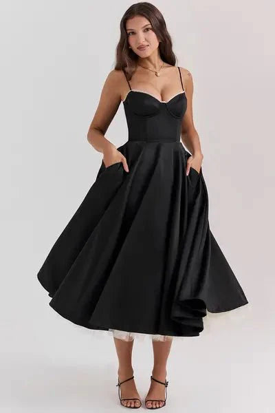 cinched waist," "voluminous skirt," "fit and flare silhouette," "sophisticated," "formal attire," and "special occasion