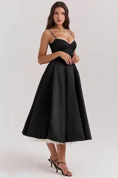 cinched waist," "voluminous skirt," "fit and flare silhouette," "sophisticated," "formal attire," and "special occasion