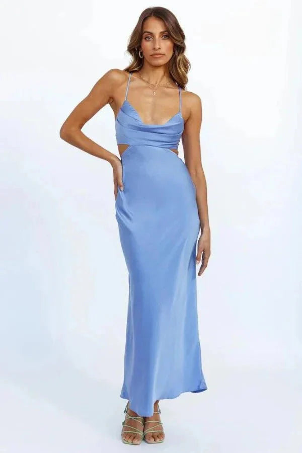 Model wearing the Kouvr Fashion Clamille open-back satin maxi dress in cornflower blue