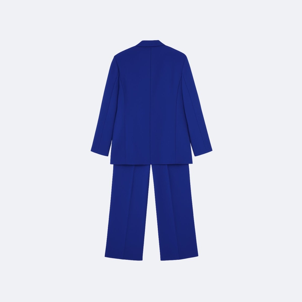 Flat lay of the back of the Kouvr Fashion electric blue women's suit, displaying the clean construction and rich color of the blazer and trousers.