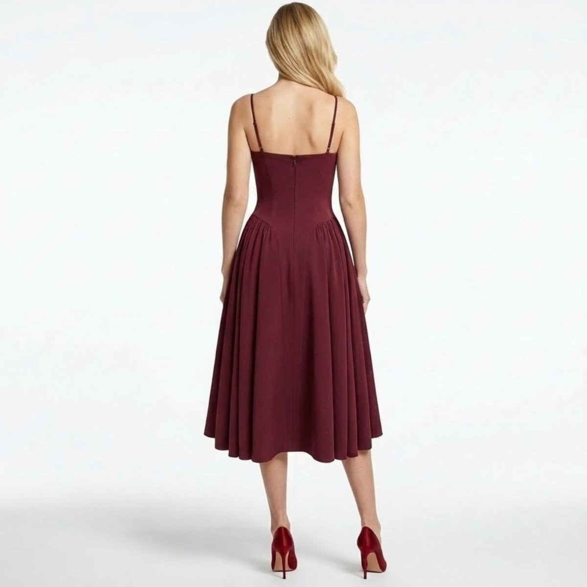 Back view of the Evdokia burgundy dress showcasing the spaghetti straps and concealed zipper closure by Kouvr Fashion.
