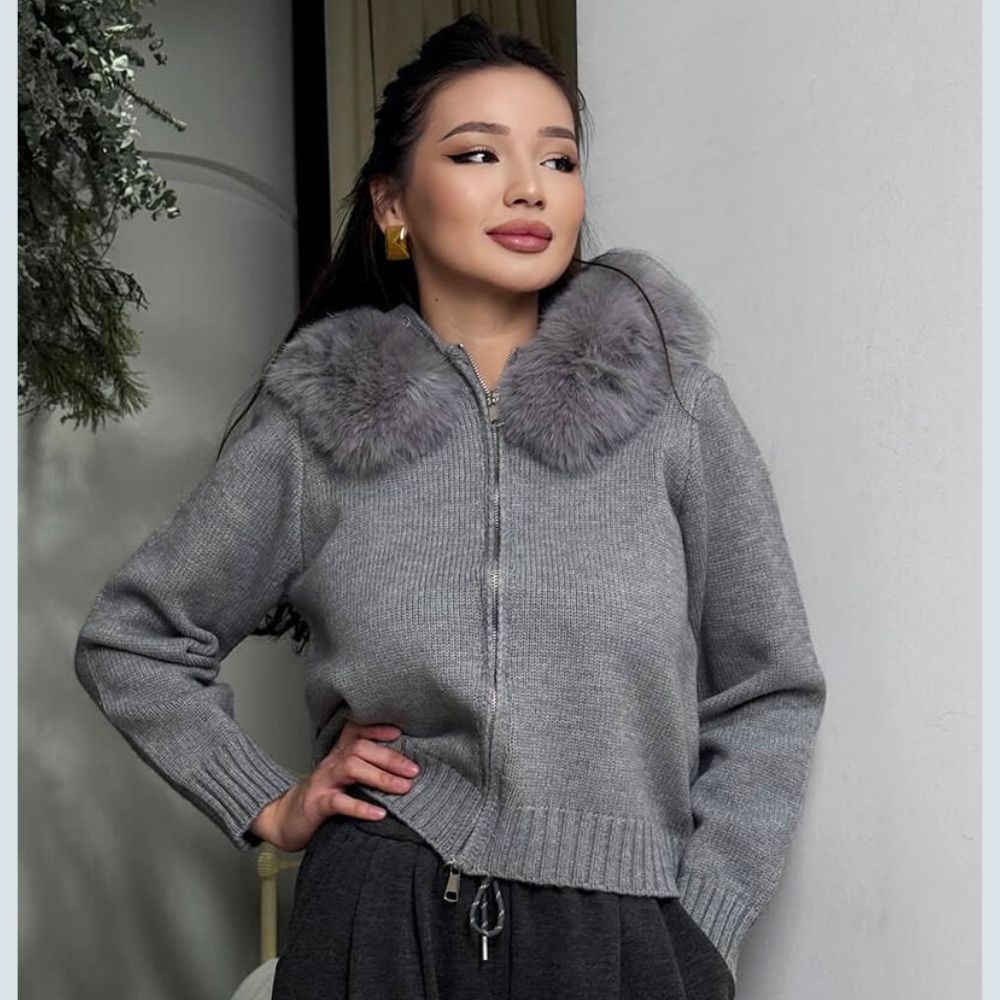 Model wearing Kouvr Fashion gray wool and cashmere blend hooded cardigan with silver fox fur trim