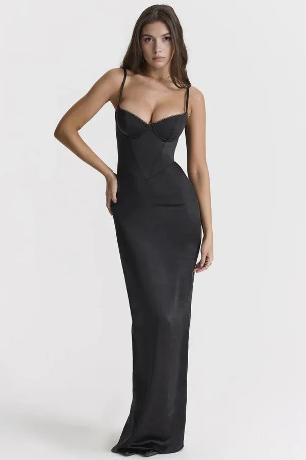 Model wearing the black Haven satin corset maxi gown by Kouvr Fashion, showing the full-length silhouette and boned bodice.