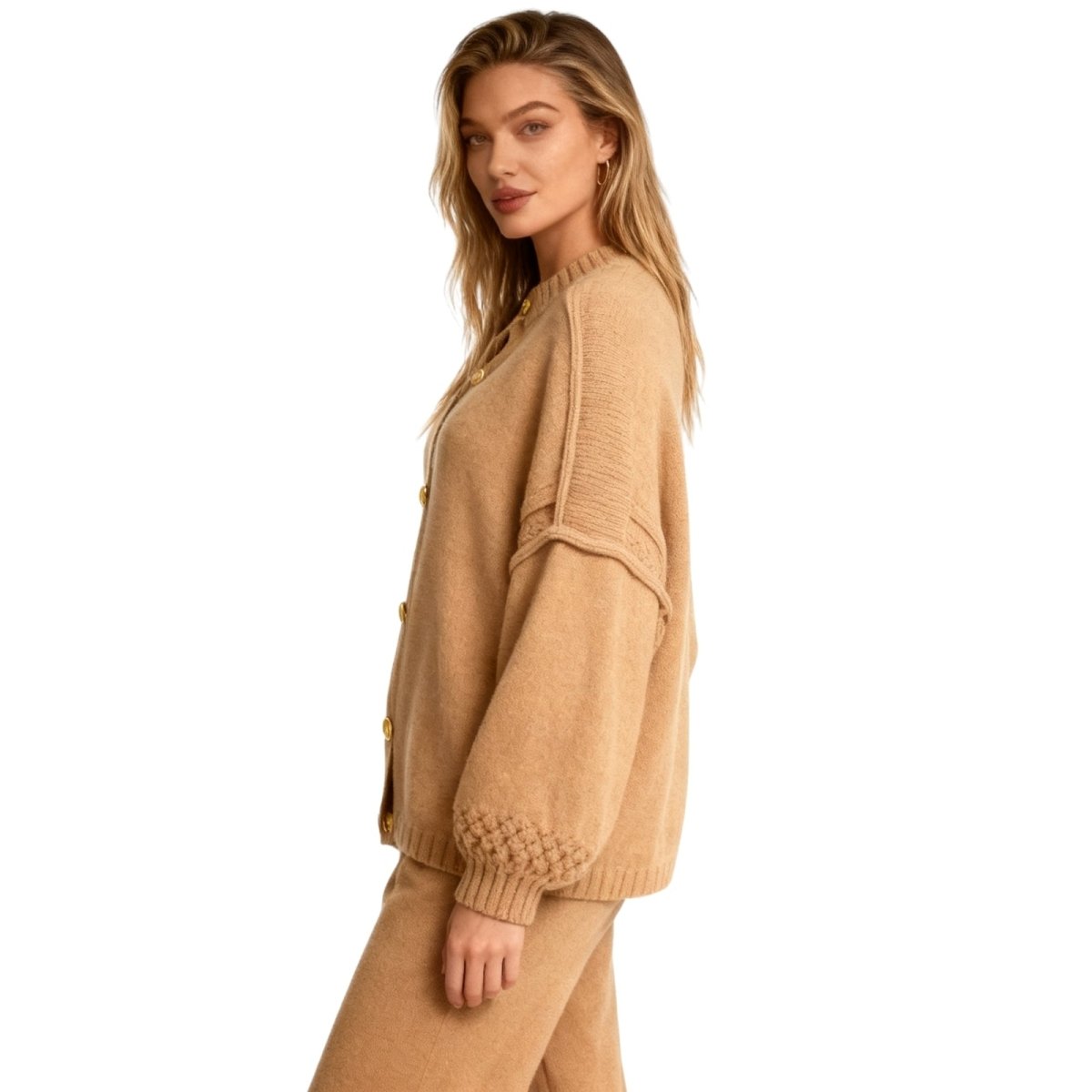 Woman wearing a Khaki Kouvr strapless jumpsuit on a white background