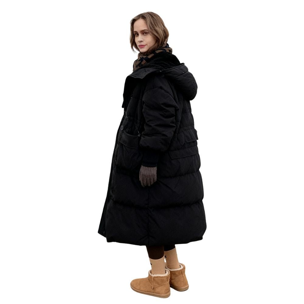 Model wearing the women's long black hooded down puffer coat